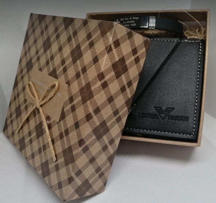 Men's leather wallet and bracelet gift set presented in a premium gift box